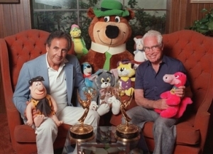 William Hanna (right), Cartoonist.  Co-Founder of Hanna-Barbara animation studio which produced cartoons such as "The Flinstones", "The Jetsons", "Scooby Do", "Yogi Bear" and "The Smurfs"